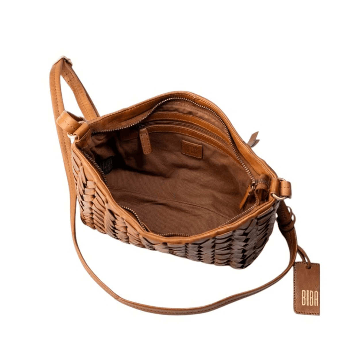 Intérieur du sac bandoulière BIBA Elk cognac avec doublure en coton et poche zippée