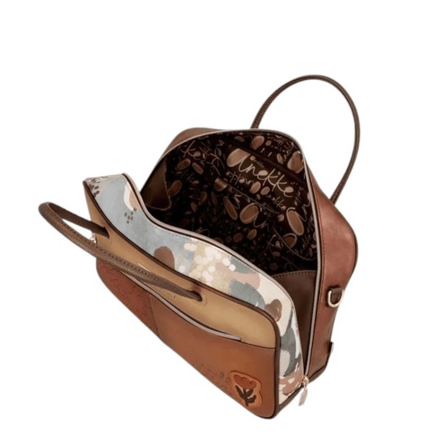 Grande ouverture zippée du sac Anekke Tulip révélant son intérieur imprimé.