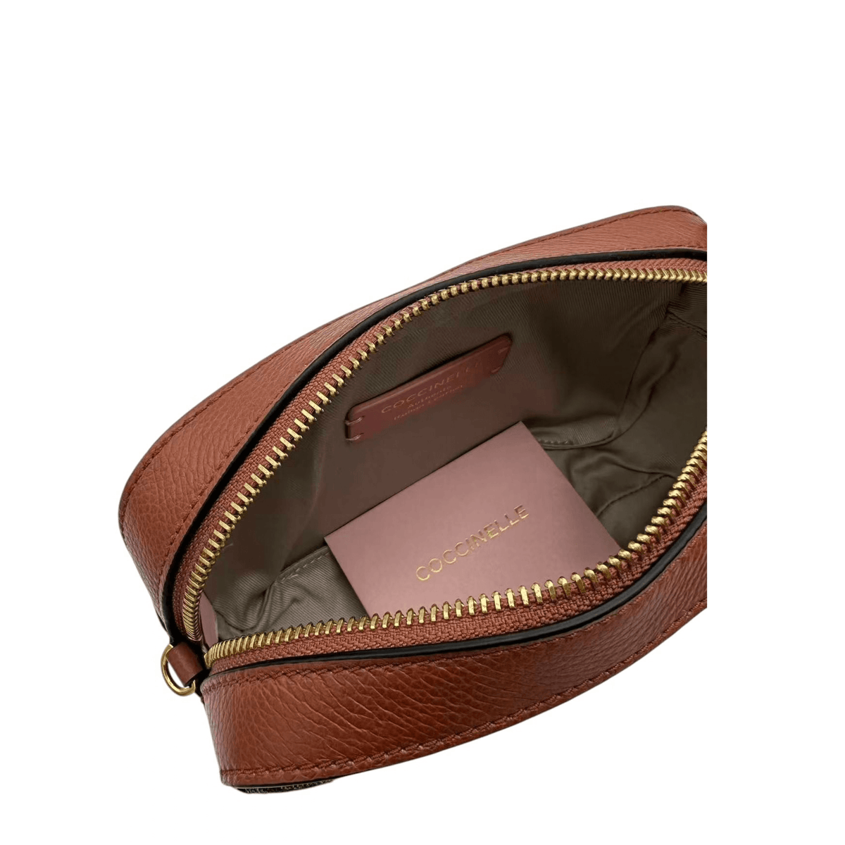 Intérieur du sac bandoulière COCCINELLE cuir châtaigne et motif
