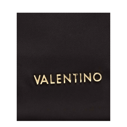 Détail logo Valentino Bags doré sur sac noir femme
