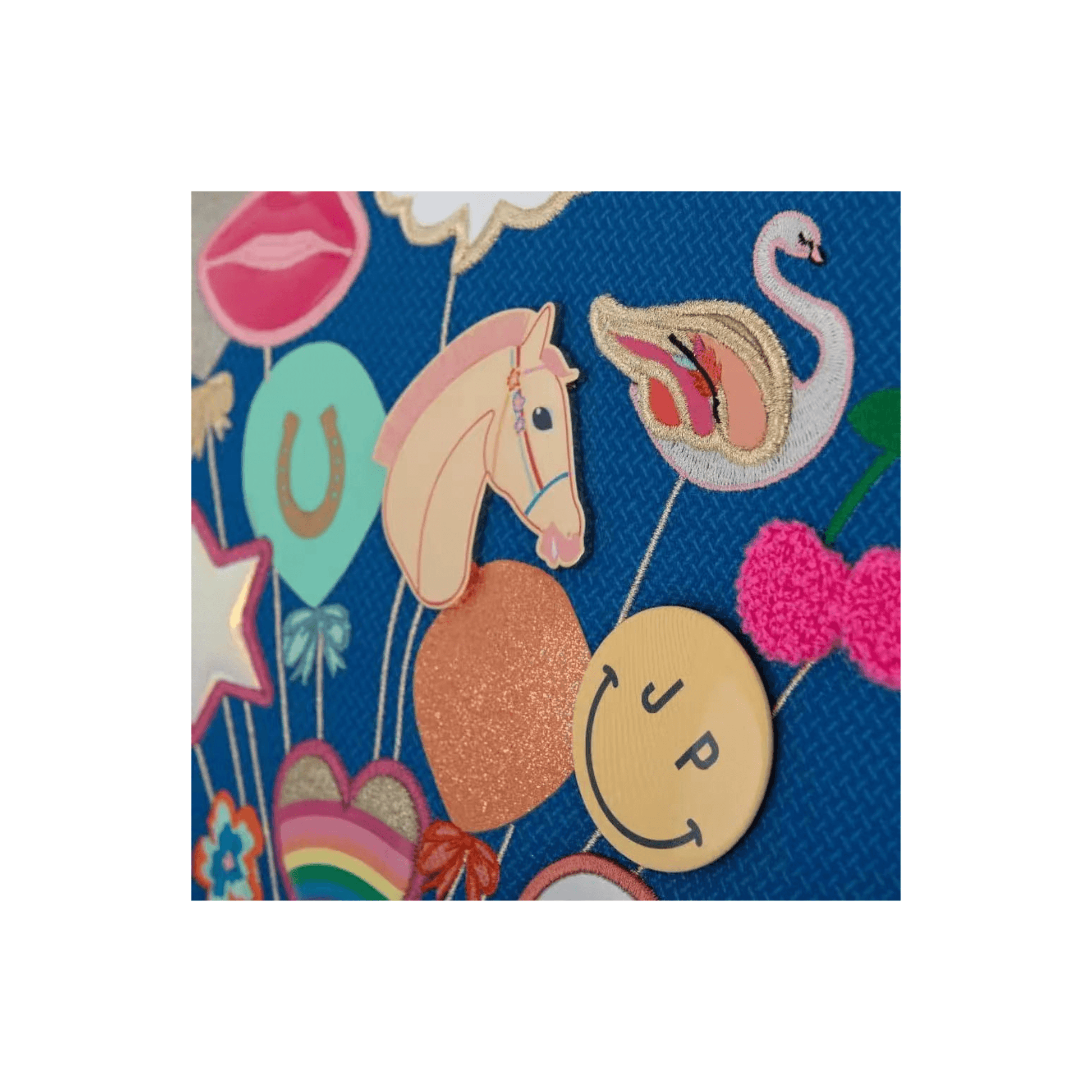 Détail motifs colorés Balloon Blast Jeune Premier
