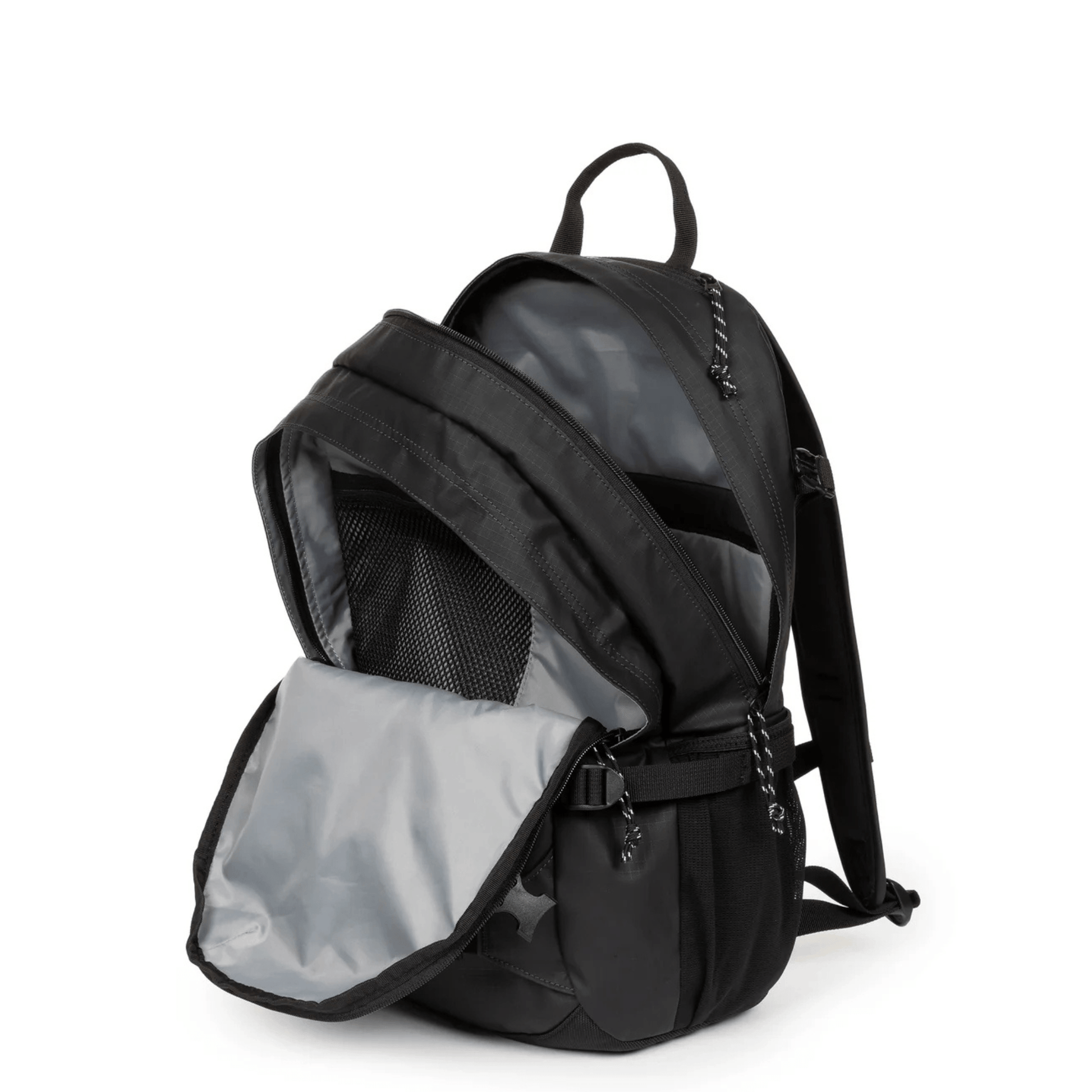 Intérieur du sac à dos Eastpak Getter Pro Rip Black Coat avec compartiment rembourré pour ordinateur portable 16 pouces.