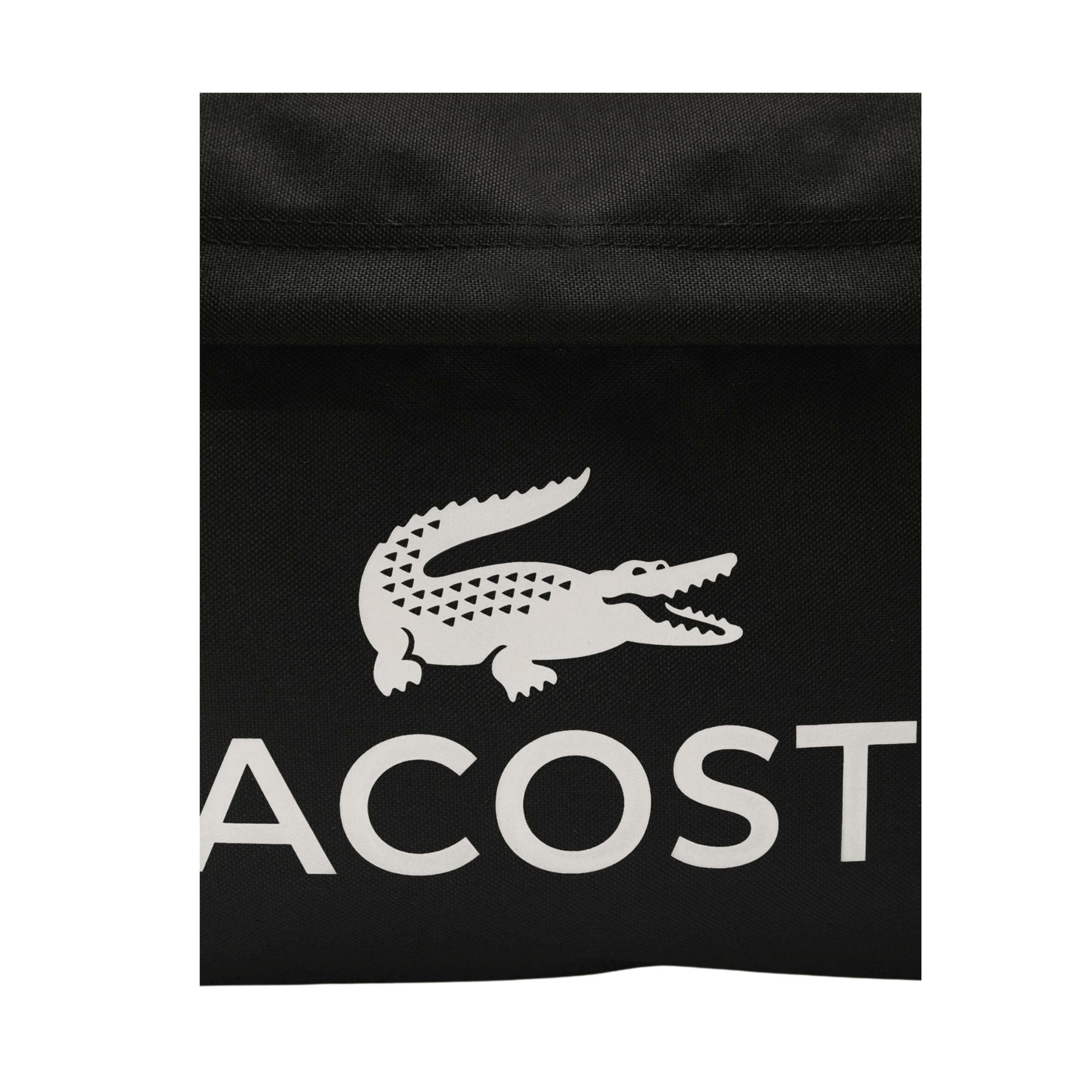Détail du logo crocodile Lacoste sur la poche avant.