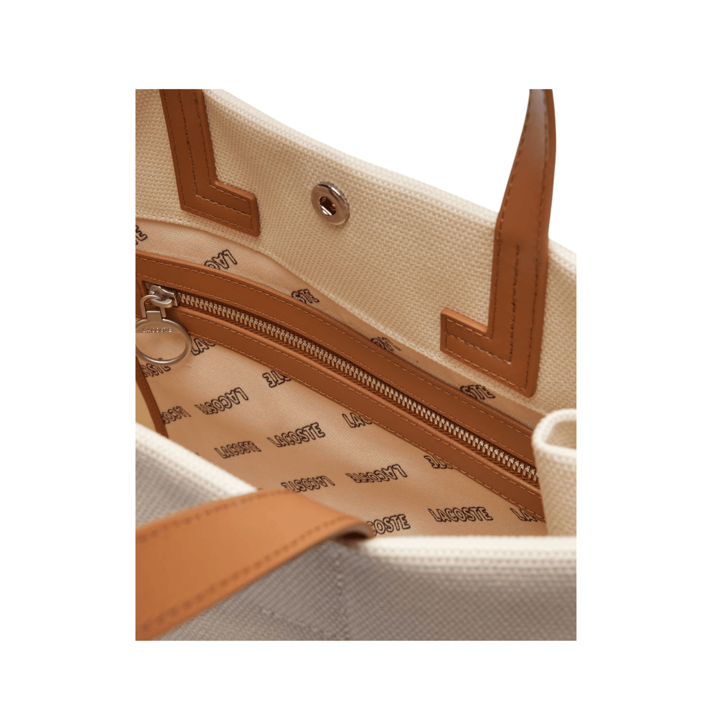 Intérieur du sac cabas Lacoste avec poche zippée
