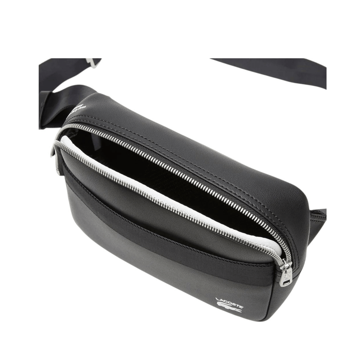 Sacoche Lacoste NH4018PN000 noire ouverte, détail du compartiment intérieur, de la fermeture éclair argentée et des finitions en cuir